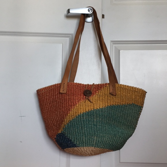 woven bag with leather straps